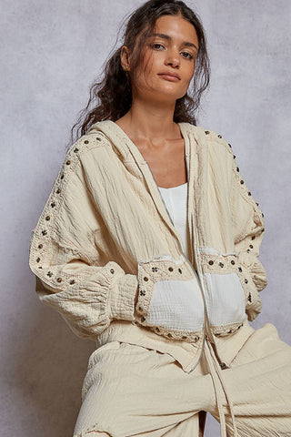 Light gray vintage hoodie jacket with stud trim and a relaxed fit