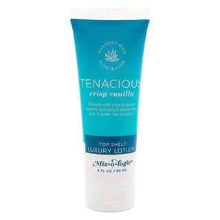 Elegant bottle of TENACIOUS (crisp vanilla) Mixologie Lotion, luxurious skincare for soft, nourished skin.