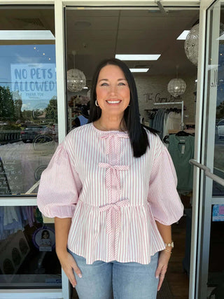 Pink Seersucker Tie Front Top by Oddi, featuring a lightweight, textured fabric and stylish tie front design for a chic look.