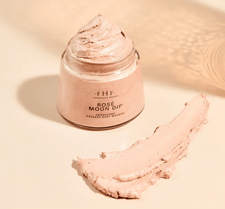 FHF Rosé Moon Dip® Limited Edition Iridescent Ageless Body Mousse in pink packaging on a soft pink background.