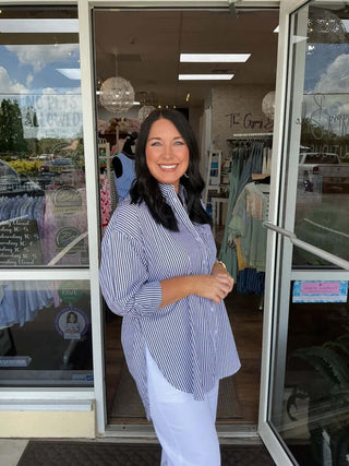 Women's Stripe Oversize Button Down High Low Top in two colors, featuring a relaxed fit and stylish design.