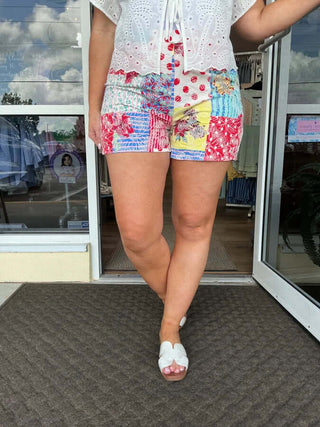 Colorful American Girl Patchwork High Waist Shorts with various geometric patterns, perfect for a trendy, playful summer look.