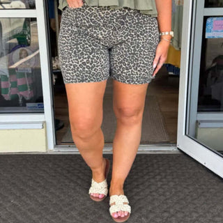 Stylish leopard print twill shorts with a comfortable fit, perfect for a bold summer fashion statement.