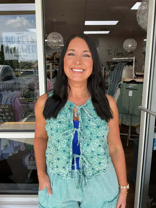 Dusty teal vest with floral embroidery and tie front by JHer; stylish layering piece for boho-chic fashion enthusiasts.