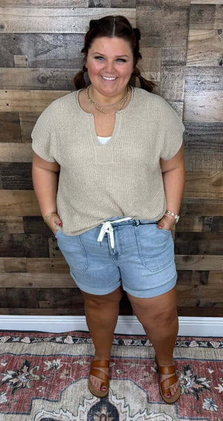 Judy Blue Cuffed Jogger Shorts in light denim, featuring a relaxed fit and stylish cuffed hems for casual comfort.