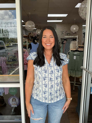 Stripe Floral Split Neck Ruffle Sleeve Top by Blu Pepper in two colors, showcasing elegant design and comfortable fit.