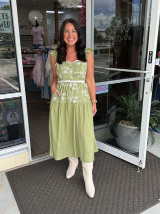 Green floral embroidered midi dress by &Merci, showcasing elegant matcha hues and a chic design for timeless fashion allure.