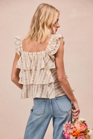 Ivory & pink floral Bibi top with bow, ruffle square neck, and elegant design, perfect for a chic and stylish look.