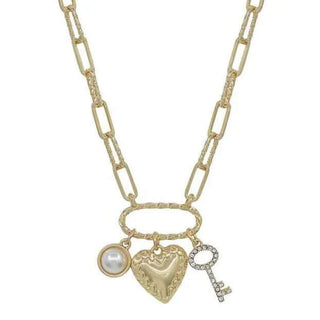 Elegant gold link necklace featuring a heart key and pearl charm, adjustable 16-18 inches, perfect for adding a touch of romance.