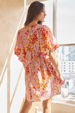 Pink and white printed striped babydoll dress with puff sleeves and relaxed fit, floral motif and tiered hem Oddi dress.