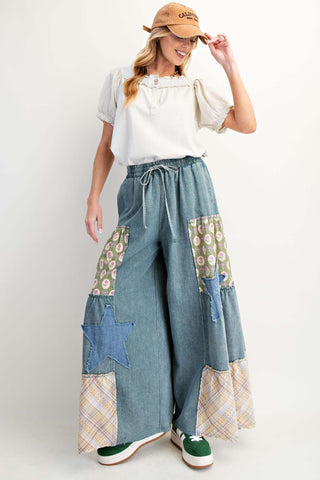 Stylish washed denim patchwork palazzo pants by Easel with wide-leg design, perfect for a trendy and comfortable look.
