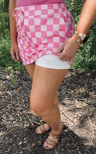 Jess Lea pink checkered skort, stylish and versatile, perfect for casual outings and summer vibes.
