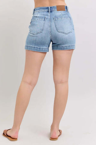 Medium‑wash denim midi‑length classic shorts with clean finished hem and five‑pocket styling—Judy Blue