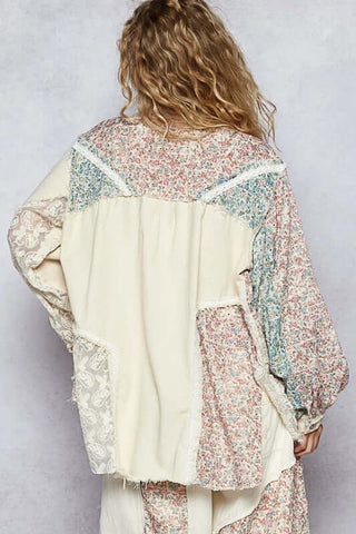 POL Ivory & Floral Hi-Lo Shacket Top featuring delicate crochet detailing, for a stylish layered look. Perfect for any occasion.