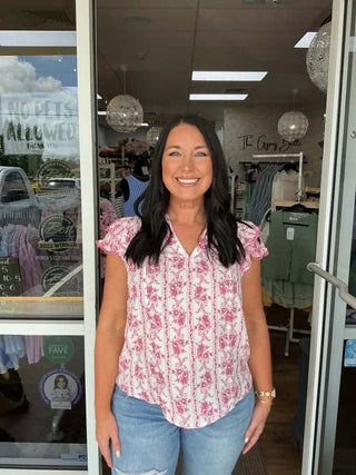 Stripe Floral Split Neck Ruffle Sleeve Top in two colors by Blu Pepper, displayed on a hanger against a white background.