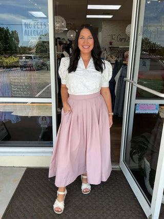 Dusty Mauve Pleated Midi Skirt with Pockets by Heyson - Elegant and Stylish Women's Fashion.