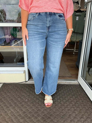 Mica W182M Denim Med Wash Super High Wide Leg Jeans showcasing stylish design and comfortable fit on mannequin.