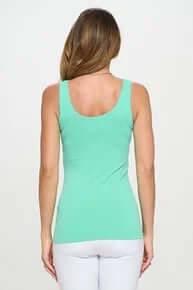 Model wearing Spicy Mint buttery soft reversible seamless tank, showcasing versatility and comfort.