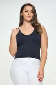 Alt text: "Chic ribbed black reversible seamless tank top on hanger, perfect for versatile and stylish everyday wear.