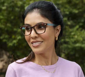 Sinclair Leopard Tortoise Blue Readers by Peepers featuring stylish round frames with a vibrant blue leopard pattern.