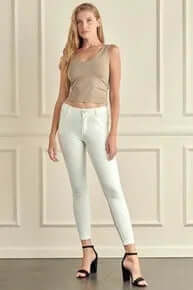 Light mocha buttery soft reversible seamless tank top on a hanger, showcasing its versatile style and comfort.