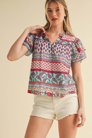 &Merci Turquoise Paisley Print Flutter Sleeve Top - Stylish, lightweight blouse ideal for summer with vibrant paisley patterns.