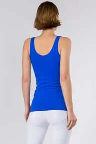 Model wearing Royal Blue Buttery Soft Reversible Seamless Tank in stylish, versatile design for comfort and elegance.