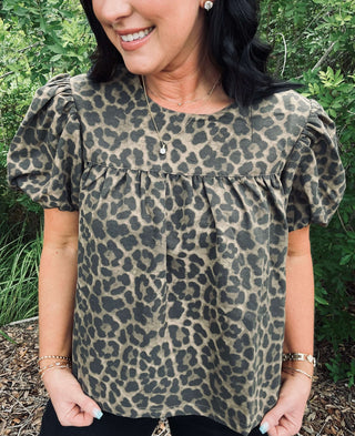 Stylish 'Things Between' Leopard Twill Baby Doll Top - Perfect for chic, trendy looks. Lightweight fabric, animal print design.