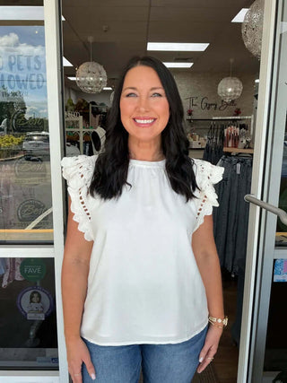 Chic Crochet Ruffle Sleeve Top in Ivory and Charcoal, by Heyson, adding flair to any outfit.