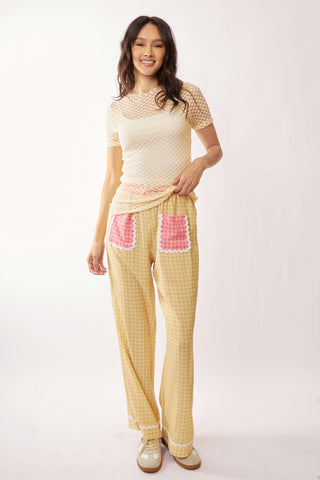 Stylish cream dot lace mesh layering top with round neck and short sleeves, perfect for elegant looks.