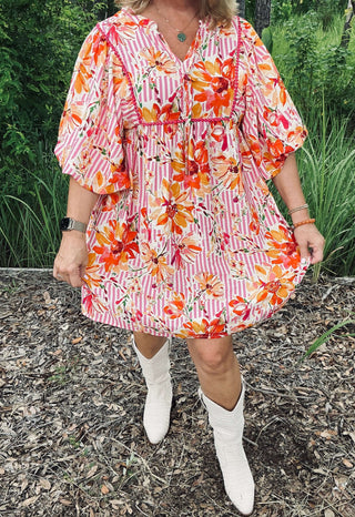 Pink and white printed striped babydoll dress with puff sleeves and relaxed fit, floral motif and tiered hem Oddi dress.