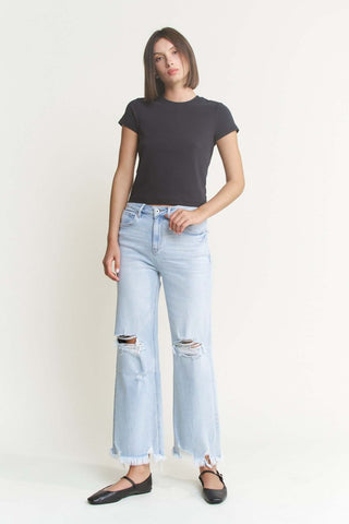 MICA W3522LT super high-rise distressed straight-leg jeans in light wash, offering trendy vintage appeal and comfort.