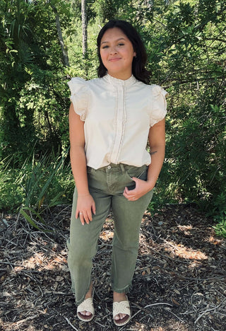 Chic ee:some Ruffle Trim Top with Flutter Sleeves, available in 2 colors, perfect for stylish and comfortable outfits.