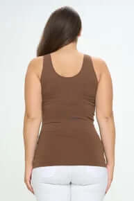 COFFEE Buttery Soft Reversible Seamless Tank showcasing sleek, comfortable design on hanger in bright setting.