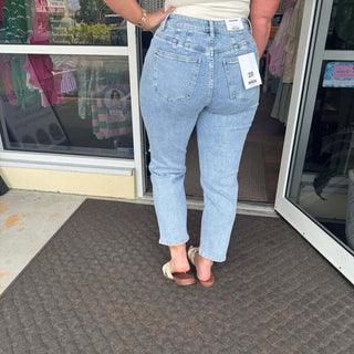MICA M3400 Denim Lt Wash High Rise Distressed Mom Jean in light blue with stylish rips and a relaxed fit