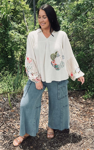 Women's washed wide-leg French terry cargo pants by Easel, available in four colors, featuring pockets and comfortable fit.