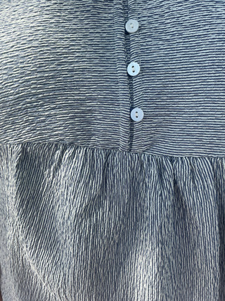 Navy and ivory ruched apron top with a stylish design and adjustable straps