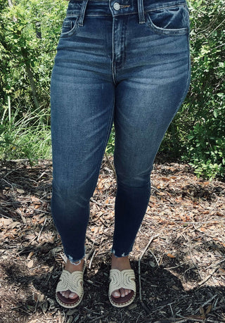 Alt text: "Vervet Dk Wash MidRise Cropped Skinny Jeans T5947 showcasing sleek design on a mannequin
