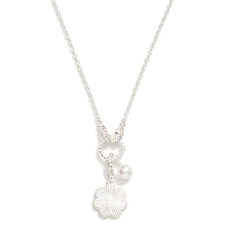 Elegant silver chain necklace with a hoop pendant adorned with delicate charms, perfect for any occasion.