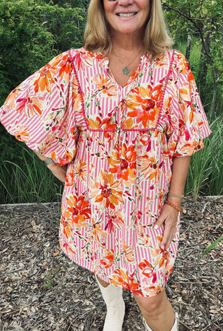 Pink and white printed striped babydoll dress with puff sleeves and relaxed fit, floral motif and tiered hem Oddi dress.