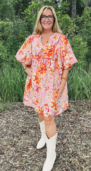 Pink and white printed striped babydoll dress with puff sleeves and relaxed fit, floral motif and tiered hem Oddi dress.