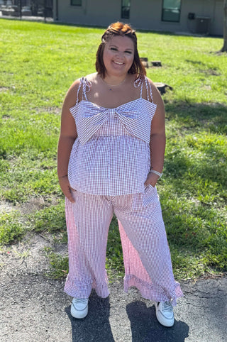 Red & white checkered bow top with matching ruffle crop pants set by Oddi, perfect for stylish casual or festive occasions.