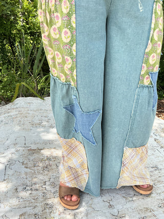 Light blue washed denim wide leg palazzo pants with patchwork detailing