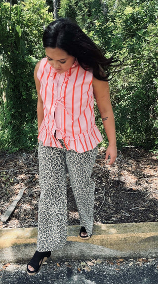 Alt text: "Pink & Coral Stripe Front Tie Peplum Top Sleeveless - Stylish and vibrant sleeveless top with a flattering peplum design.