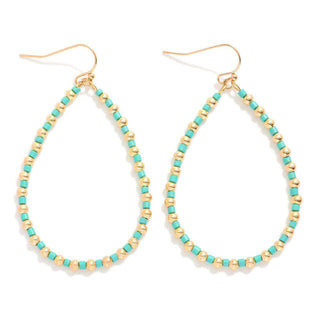 Alt Text: "Elegant turquoise and gold beaded teardrop earrings with intricate design, perfect for adding a touch of glamour.
