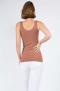 Model wearing MOCHA buttery soft reversible seamless tank, showcasing versatile style and comfort in a neutral tone.