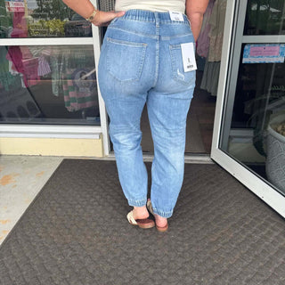 MICA Denim High Rise Jogger Jeans in Light Wash - Comfortable fit, trendy style, and elastic waistband. Final sale item.
