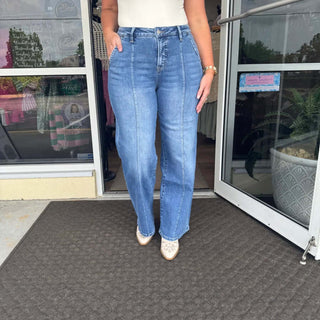 Wide leg linear jeans in a medium wash denim; stylish, versatile MICA W3274 design ideal for casual or trendy outfits.
