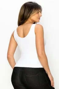 White buttery soft reversible seamless tank top displayed on a hanger against a white background
