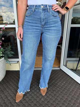 Lovervet LV1210M Med Wash High Rise Loose Fit Uneven Hem Jeans – Stylish, comfortable, and perfect for a trendy look.